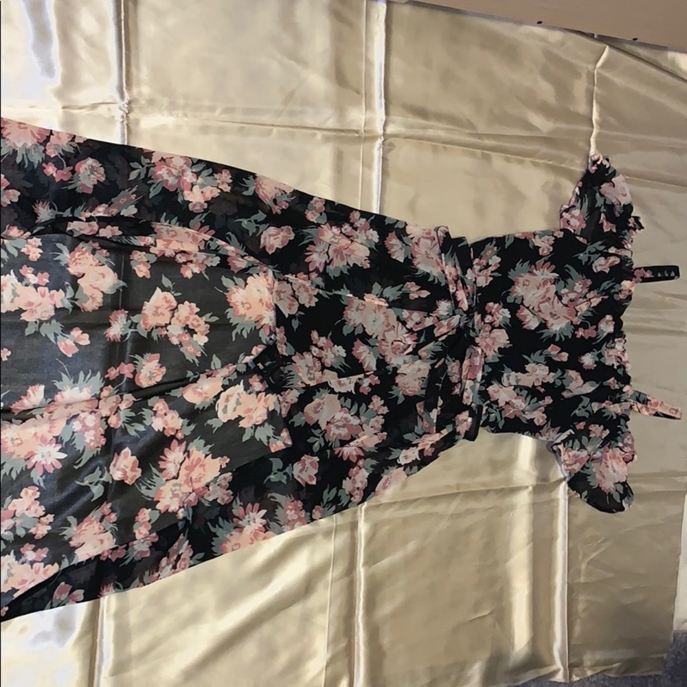 Floral romper with a long back